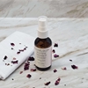 Rose Facial Cleansing Oil on Counter